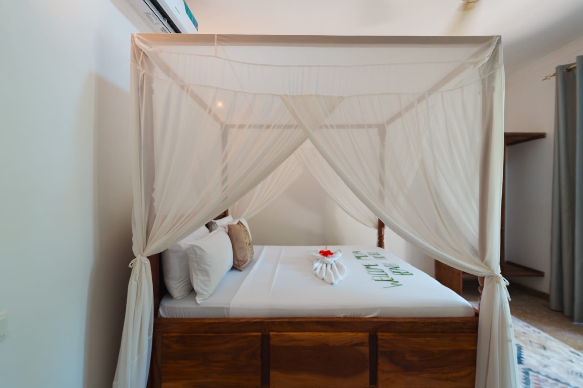 Canopy bed room at Moya Beach Hotel