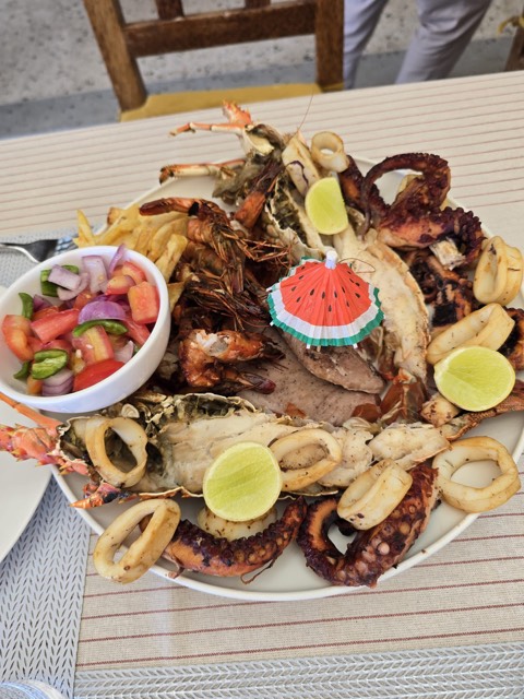 Seafood platter with tomato salad